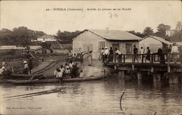 Postcard Douala Duala Cameroon, arrival of dried fish at the market, people by the water