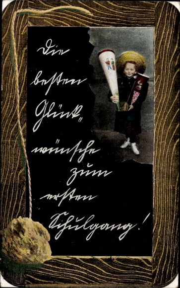 Congratulations on starting school, boy with a candy cone