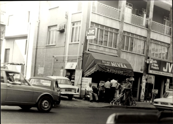 Photo Nicosia Cyprus, street traffic, cars, pedestrians, Nivea store