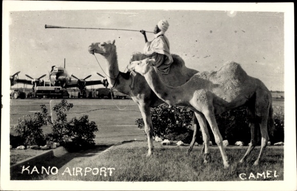 Postcard Kano Nigeria, airport, man riding camel