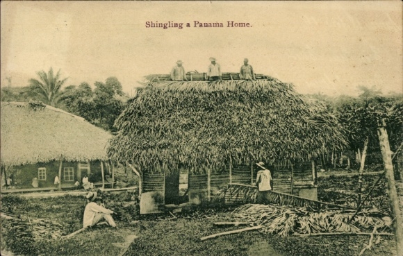 Postcard Ciudad de Panama, roofing of a house, locals, palm trees, traditional construction