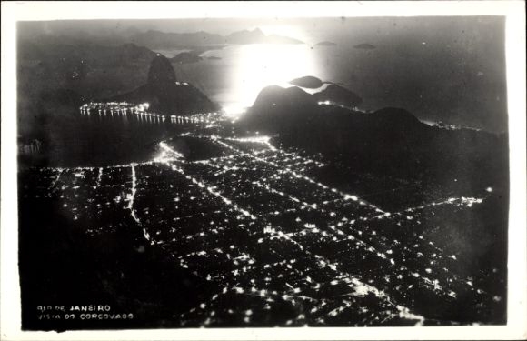 Postcard Rio de Janeiro Brazil, aerial view of Corcovado, nighttime lighting