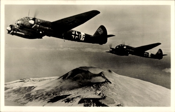 German Junkers Ju 88 fighter planes over Mount Etna