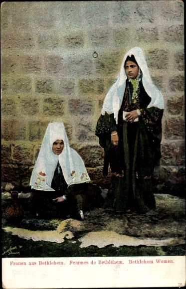 Postcard Bethlehem Palestine, Two women in traditional clothing in front of a wall.
