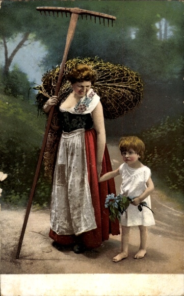 Woman with rake and child, flowers