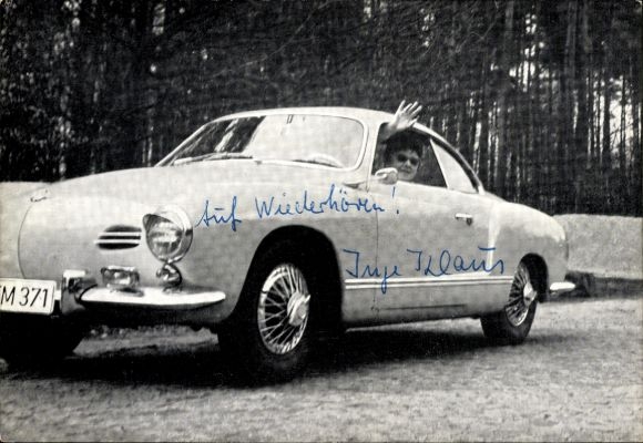 Actress Inge Klaus, portrait in car, autograph