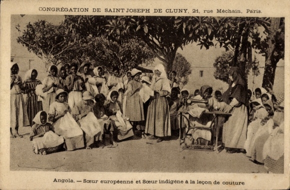Postcard Angola, European sister and indigenous sister at the sewing course with locals