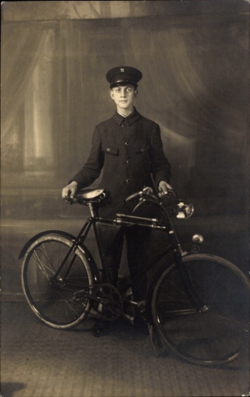 Photo Postcard Berlin, young man in uniform with a bicycle, Hans