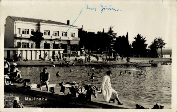 Malinska, Croatia, beach, swimmers, buildings, water, people