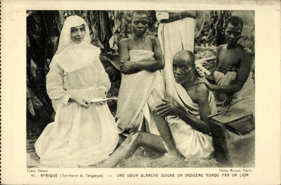 Postcard Tanzania, Tanganyika, local man bitten by lion is cared for by nurse