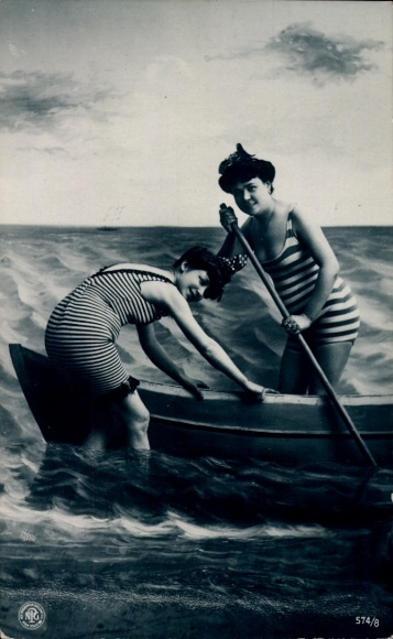 Postcard Two women in swimwear in a rowing boat