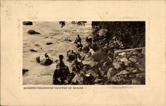 Indonesia, bathing local women and girls