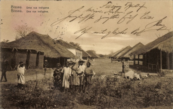 Postcard Guinea Bissau, village street, residents
