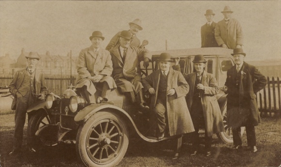 Photo Postcard Group photo of the men at the car