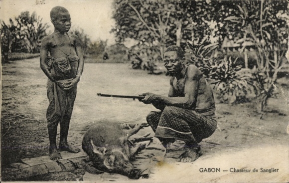Postcard Gabun, hunter with killed pig