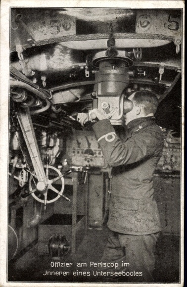 Officer at the periscope inside a submarine