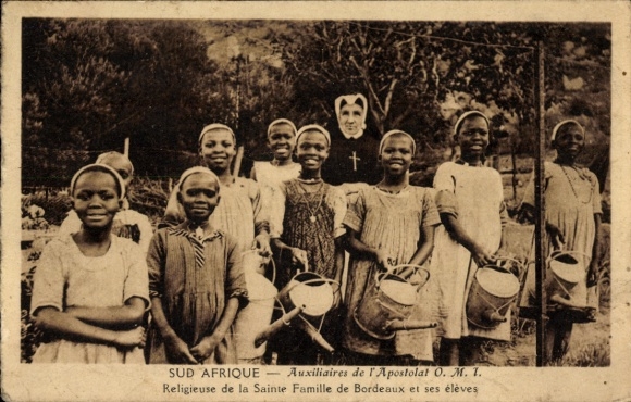 Postcard Durban South Africa, group photo of girls, nun, bucket, missionary context