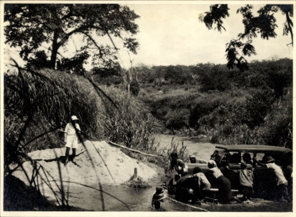 Photo Postcard Daressalam Dar es Salaam Tanzania, automobile is pushed through a river