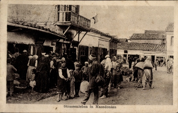 Postcard Street life in Macedonia, passers-by, houses