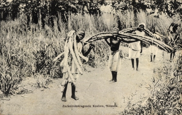 Postcard Ndanda Tanzania, sugarcane-carrying boys