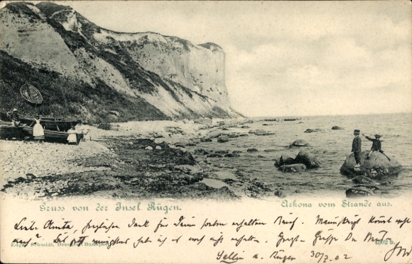PC of Rügen Island, greetings from the beach view, boats on the water, rocks in the background