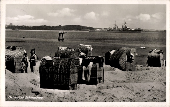Eckernförde Baltic Sea resort, beach chair, Baltic Sea resort ship in the background