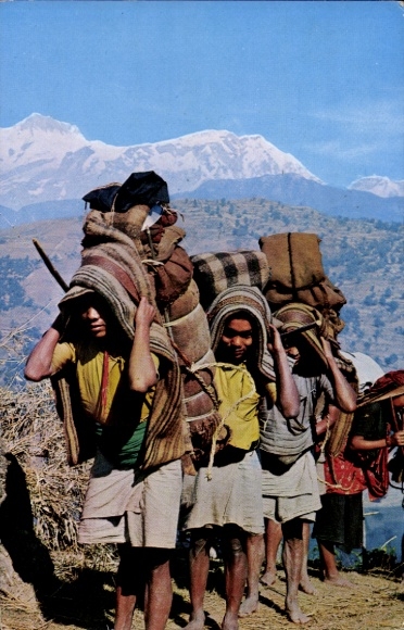 Postcard Annapurna Himalaya Nepal, highland mule track, porters, Sherpas