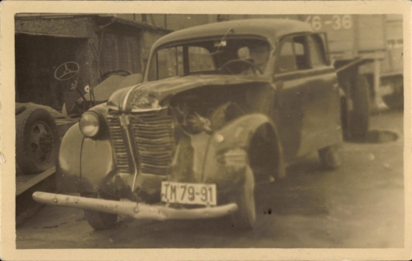 Photo of damaged car, license plate TM 79-91
