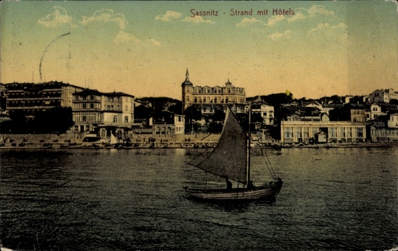 Sassnitz on Rügen, beach with hotels, boat on the water