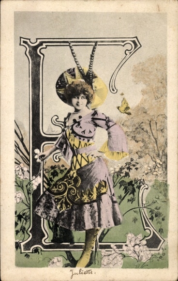 Letters Ak, letter E, woman's portrait