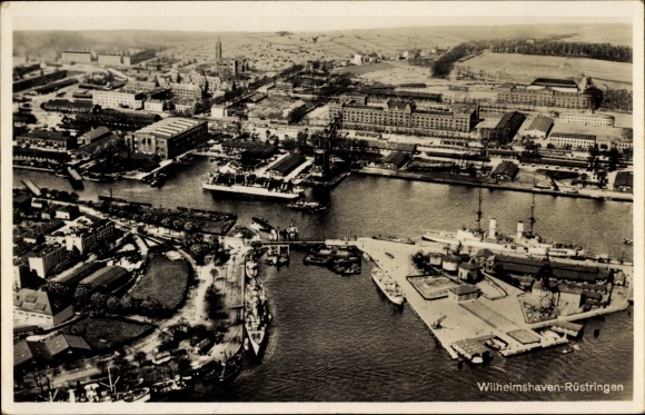 Postcard Rüstringen Wilhelmshaven in Lower Saxony, warships in the port, aerial photo