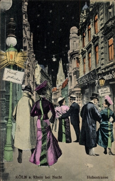 Cologne on the Rhine, Hohestraße at night, shops, strolling couples