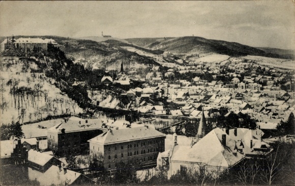 Blankenburg am Harz, snow-covered cityscape, mountains in the background, from Blankenburg