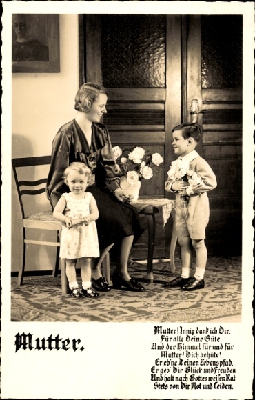 Postcard Mother's Day, children give their mother flowers