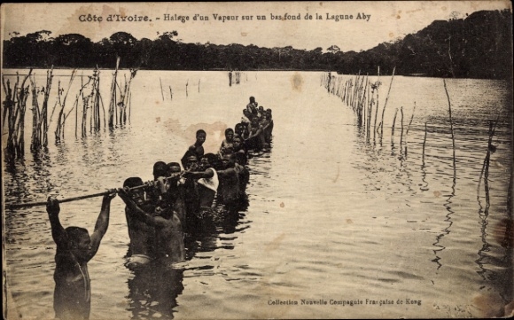 Ivory Coast, towing a steamer on a lowland of the Aby Lagoon