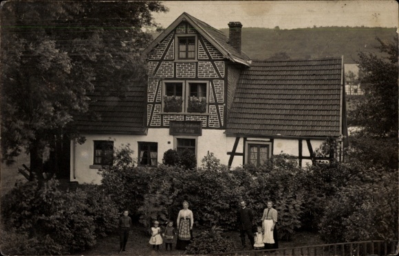 Photo: Postcard Letmathe, Iserlohn in the Märkischer Kreis district, family in the garden in front of a residential building/commercial building