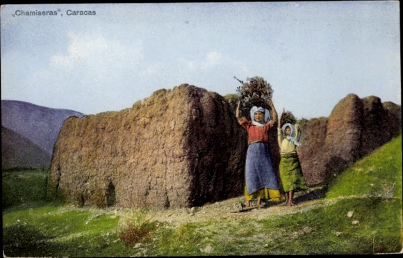 Postcard Caracas Venezuela, Two women with firewood, stone structures in the background