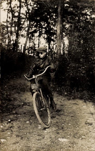 Photo: Man riding a bicycle, cyclist
