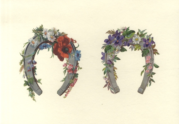 2 wafer horseshoes decorated with flowers, size approx. 12 x 10 cm each