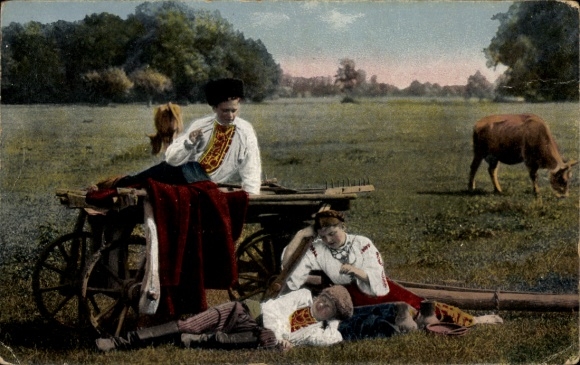 Postcard An idyllic scene from Ukraine, girls in traditional costumes in a meadow