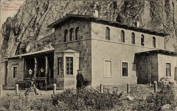 Postcard Georgia, train station, building, man in uniform